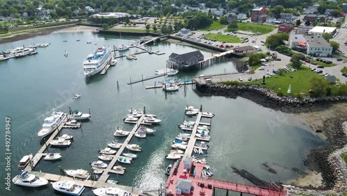 Boats Docked at Rockland Harbor in Maine (USA) | Aerial Mid-day Flyover | Summer 2021 photo
