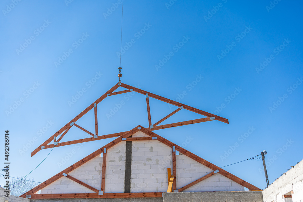 New under construction roof beams the construction site New under construction roof beams the construction site