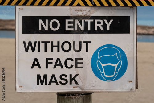 South Africa. 2022. Face mask sign on the Beach at Langabaan on the West Coast, South Africa photo