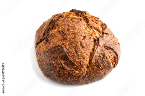 Fresh homemade golden grain bread with wheat and rye isolated on white, side view, close up.