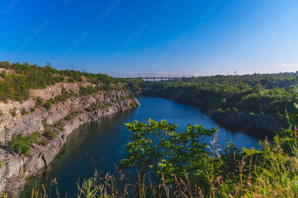 Oktyabrsky granite quarry in Krivoy Rog. Flooded quarry. Rest near the water.