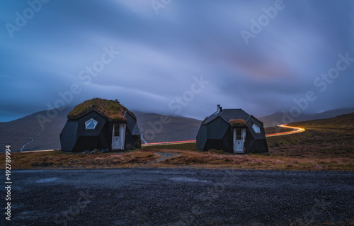 Kvivik Streymoy Faroe Islands  Denmark  Europe november 2021  Weird houses - two tiny geometric igloo homes with grass roofs on the hills. Most original houses and eco friendly in the world