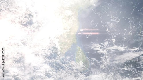Earth zoom in from outer space to city. Zooming on Thanjavur, Tamil Nadu, India. The animation continues by zoom out through clouds and atmosphere into space. Images from NASA photo