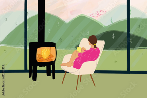 Young woman sitting on chair by the fireplace near the window at home, enjoying hot drink and view on the mountains. Concept of home cosiness and rest on nature. Vector illustration