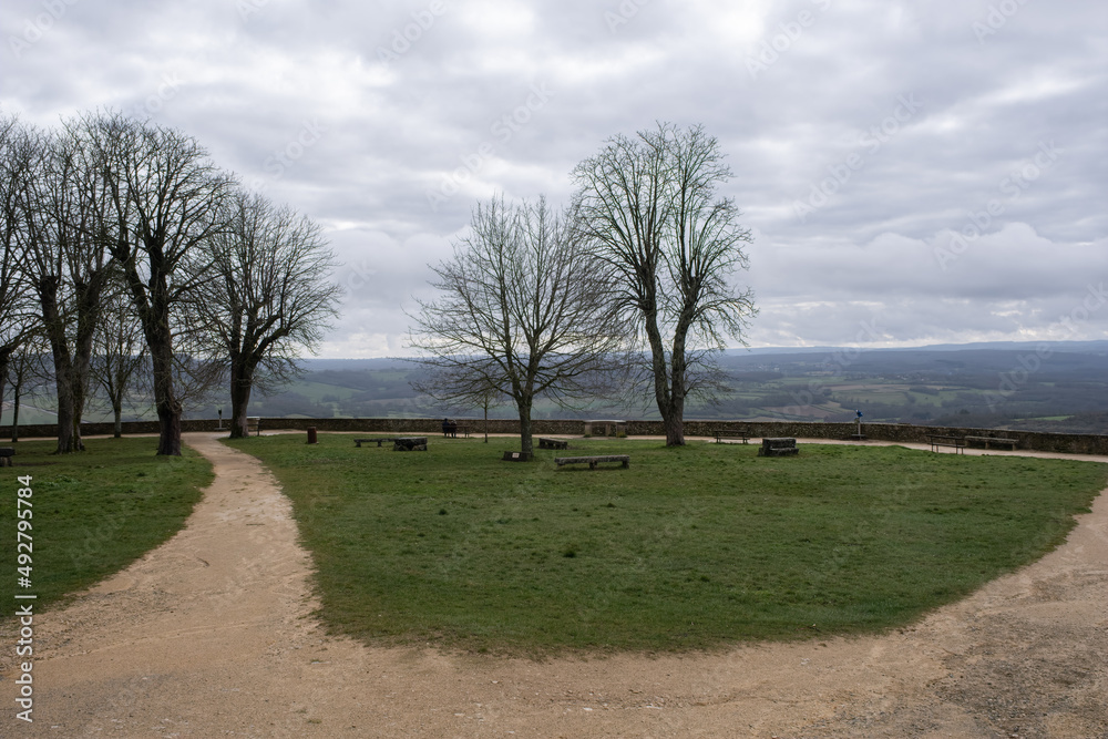 Vezelay, France - February 23 , 2022: Vezelay Abbey is a Benedictine and Cluniac monastery in the Bourgogne-Franche-Comte. Cloudy winter day. Selective focus. Vezelay, France - February 23 , 2022: Vezelay Abbey is a Benedictine and Cluniac monastery in the Bourgogne-Franche-Comte. Cloudy winter day. Selective focus.