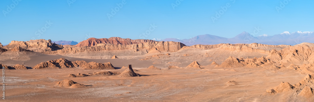 Stunning desert landscapes in the Valley of Moon (Valle de la Luna), San Pedro de Atacama, Chile. Unique rock formations, cliffs sand dunes with infinite color and texture variations. Stunning desert landscapes in the Valley of Moon (Valle de la Luna), San Pedro de Atacama, Chile. Unique rock formations, cliffs sand dunes with infinite color and texture variations.