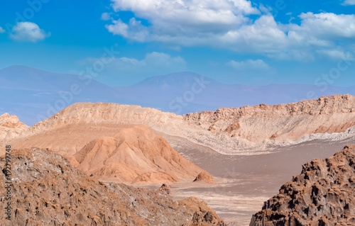 Stunning desert landscapes in the Valley of Moon  Valle de la Luna   San Pedro de Atacama  Chile. Unique rock formations  cliffs sand dunes with infinite color and texture variations.