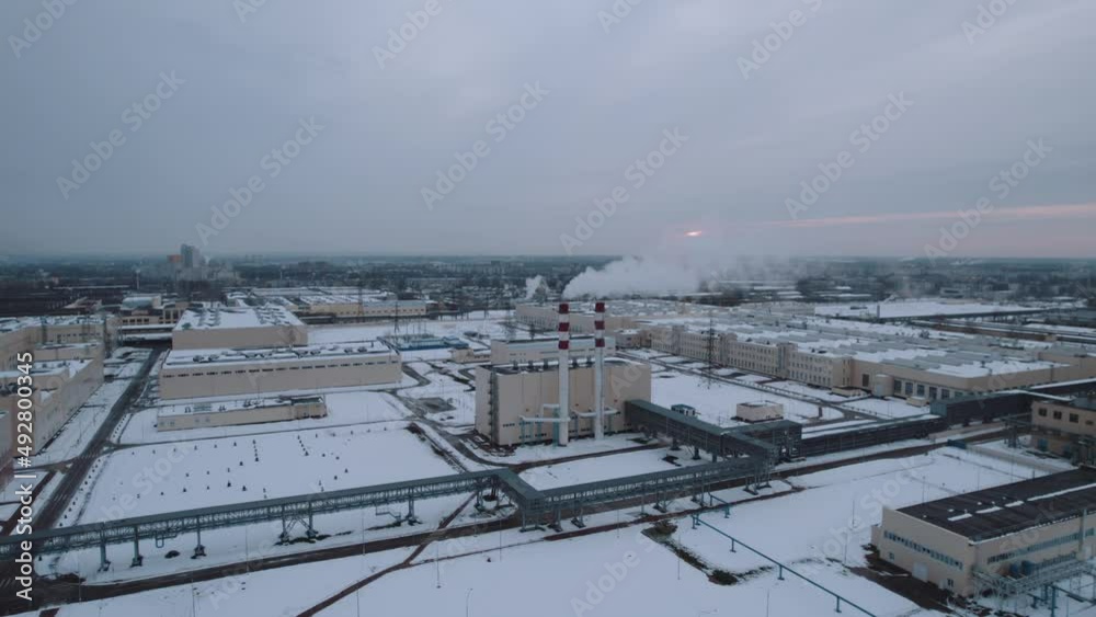 Pipes with smoke on the territory of the plant, production of weapons for air defense, production of weapons for missile defense Pipes with smoke on the territory of the plant, production of weapons for air defense, production of weapons for missile defense