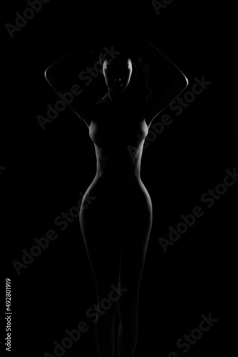 Silhouette naked nudity body of Very Slim Woman poses erotic shadow and emotional to show curve
