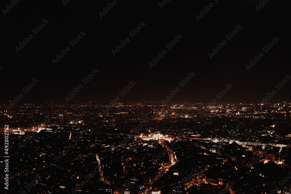 View of Paris from the Eiffel Tower, night panorama of France