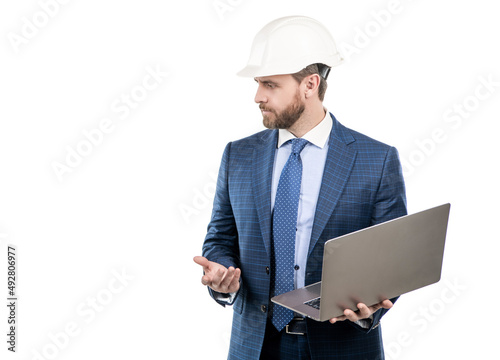 Civil engineer in hardhat and suit hold laptop computer isolated on white copy space, computing