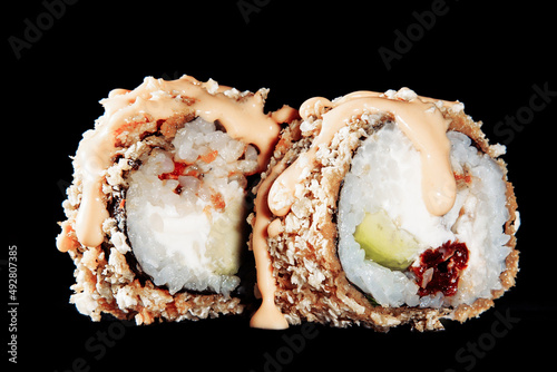 Cold cooked rice dressed with vinegar that is shaped into pieces and topped with raw or cooked fish, or formed into a roll with fish, egg, or vegetables and often wrapped in seaweed.