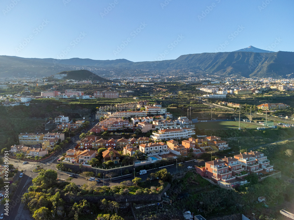 Aerial view on colorful houses and top of mount Teide in Puerto de la Cruz, Tenerife, Canary islands at sunrise