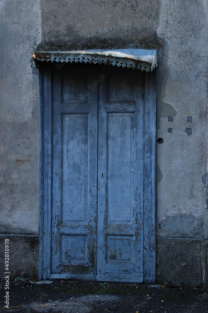 Italy, Lombardy: Old doorway of the abandoned house. Italy, Lombardy: Old doorway of the abandoned house.