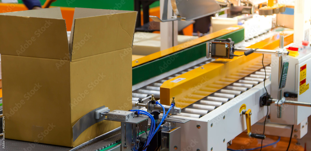 Production line of carton packing and sealing machine Production line of carton packing and sealing machine
