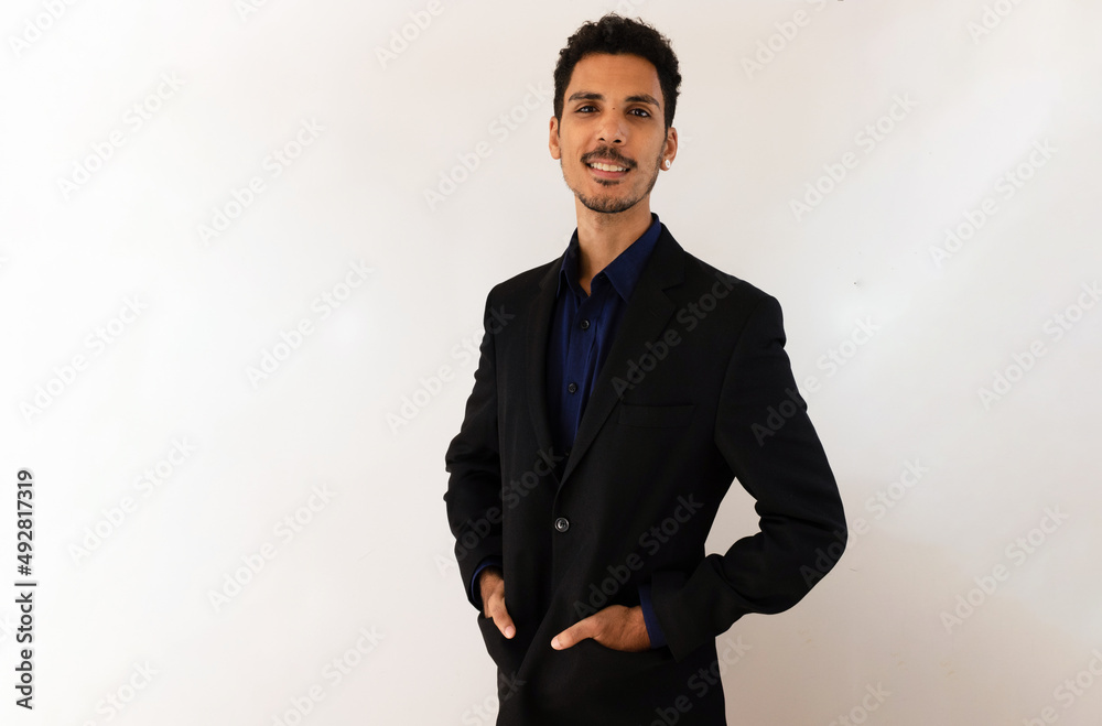 Black man in a social shirt in the studio isolated on yellow background. Isolated businessman with dramatic light. Black man in a social shirt in the studio isolated on yellow background. Isolated businessman with dramatic light.