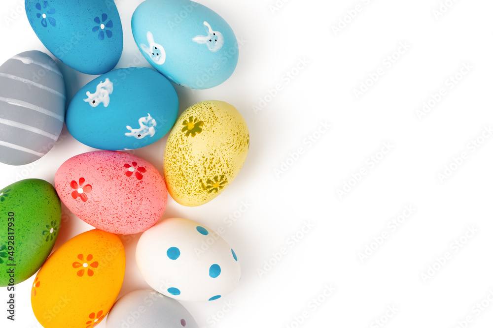 Colorful easter eggs isolated on whtie background. Easter mockup, top view, flat lay with copy space