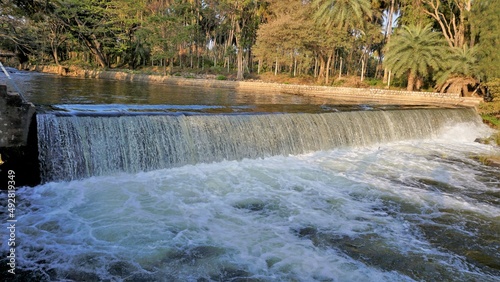 View of Cauvery river from bridge in Brindavan Gardens located inside KRS or Krishna Raja Sagara Dam. Beautiful relaxation place for people from all age groups. photo