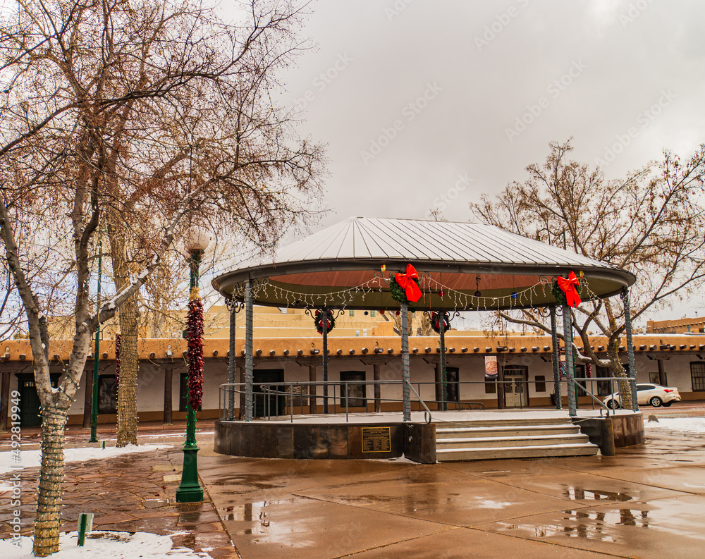 Fototapeta premium Santa Fe bandstand decorated for Christmas holidays on a cold winter morning in the historic Plaza of Santa Fe, New Mexico 