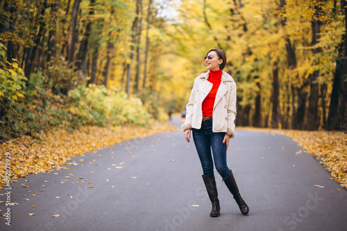 Young woman in an autumn park © Petro