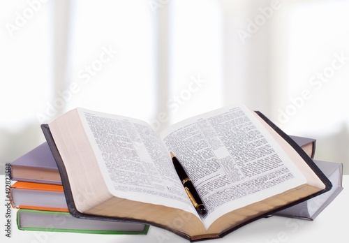 A dictionary. Dictionary pages and items. translation, Education and learning foreign language.