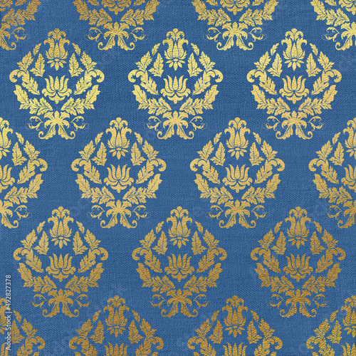 Tapestry texture background. Vintage blue paper with gold baroque pattern