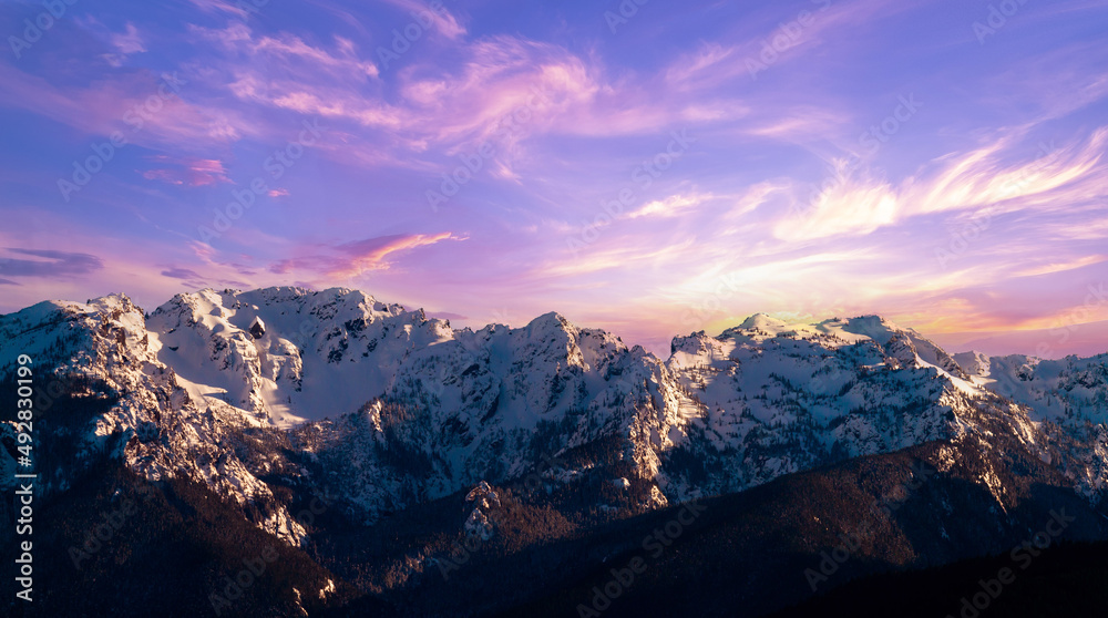 Beautiful view of the sunset in the snow mountains, Vancouver, Canada.