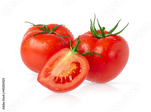 Three isolated tomatoes on white background with clipping path