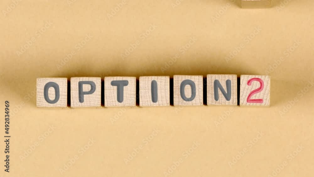 Wooden blocks with Option 1 sign going to Option 2 and Option 3. Concept of Change, Choice and Strategy. High quality 4k video. Wooden blocks with Option 1 sign going to Option 2 and Option 3. Concept of Change, Choice and Strategy. High quality 4k video.