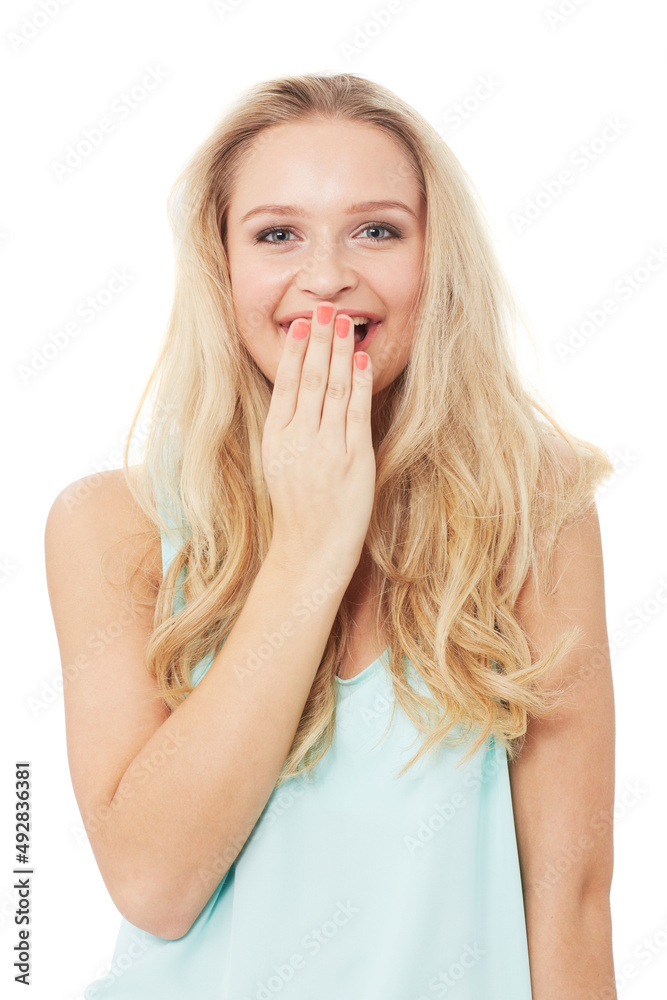 That was hilarious. A pretty young woman giggling while isolated on a white background. That was hilarious. A pretty young woman giggling while isolated on a white background.