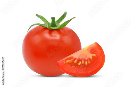 Whole, sliced tomato isolated on white background.