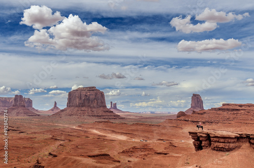 monument valley landscape in border between Utah and Arizona with a cowboy, USA
