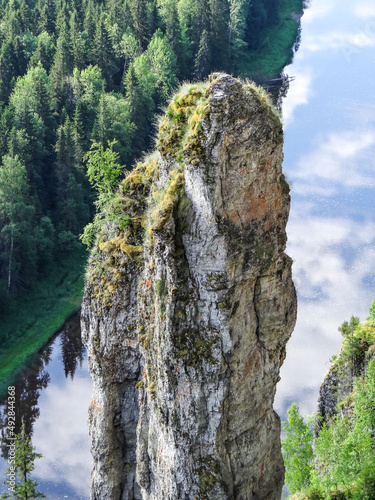 The picturesque rock-remnant of the Devil's Finger. View from above. Massif Usvinskiye Pillars. Perm region. Russia photo