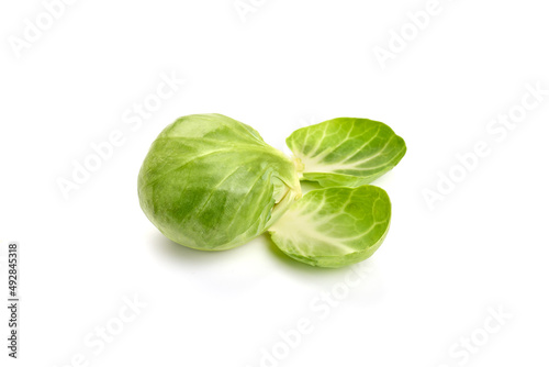 Fresh green Brussels sprouts, isolated on white background. High resolution image.