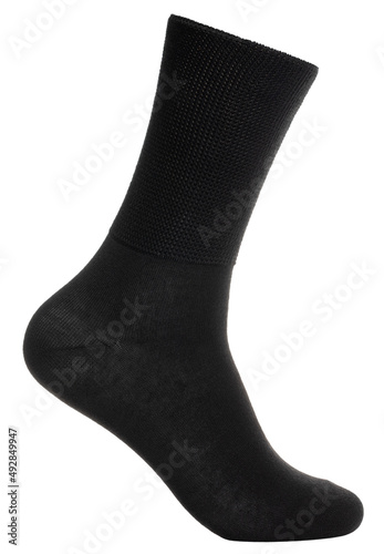 Long black sock on mannequin isolated on white photo