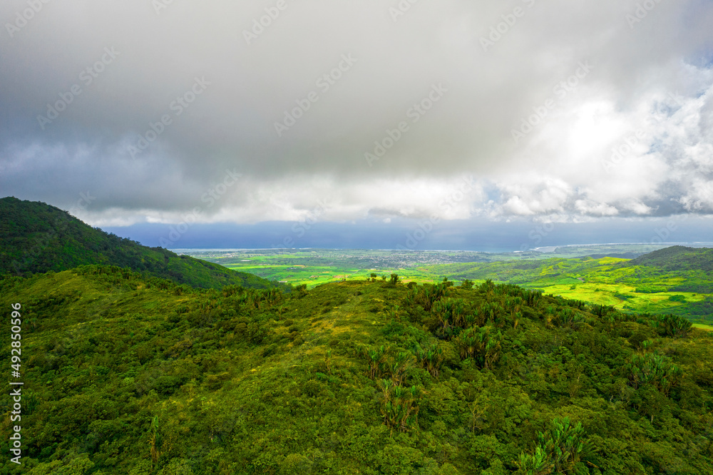 Fototapeta premium Aerial view of the south coast of Mauritius island from a hill located near Piton Savanne