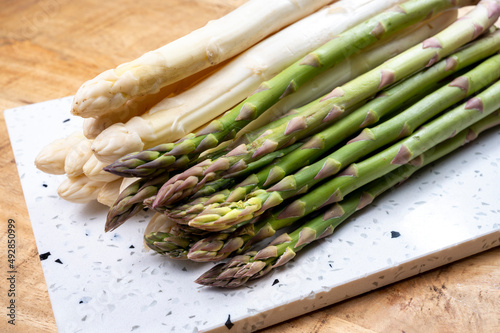 Bunch of fresh raw white and green asparagus vegetables