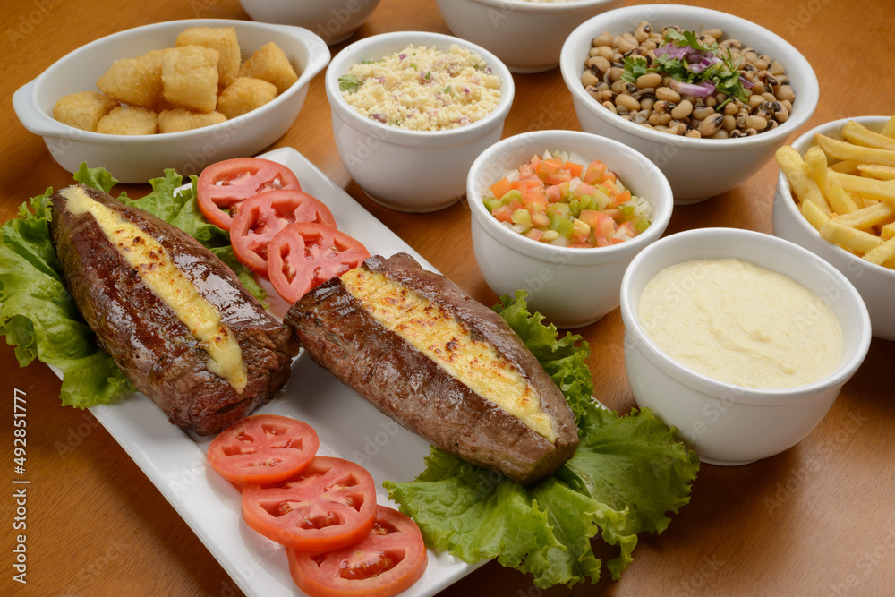 Sun meat and side dishes. Carne de sol, salted steak, typical dish from the Brazilian northeast.