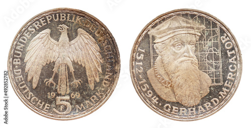 Germany - circa 1969: a 5 German Mark coin of the Federal Republic of Germany with the cote of arm eagle and a portrait of the German geographer and cartographer and globe maker Gerhard Mercator. photo