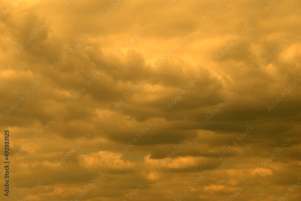 yellow sky gray clouds background