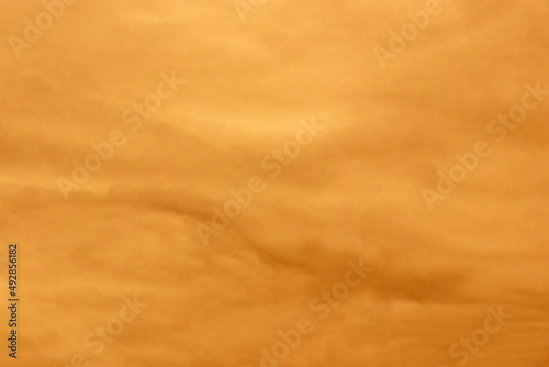 Billede på lærred Orange yellow clouds over the roofs of Augsburg city during Sahara dust storm
