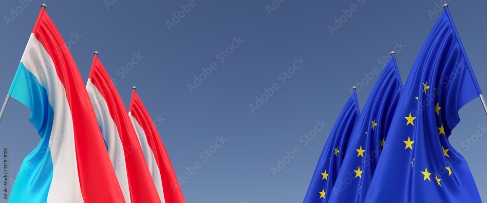 Three flags of European Union and Luxembourg on flagpoles on the sides.  Flags on a blue background. Place for text. EU, Europe. Grand Duchy.  Commonwealth. 3D illustration. Stock Illustration
