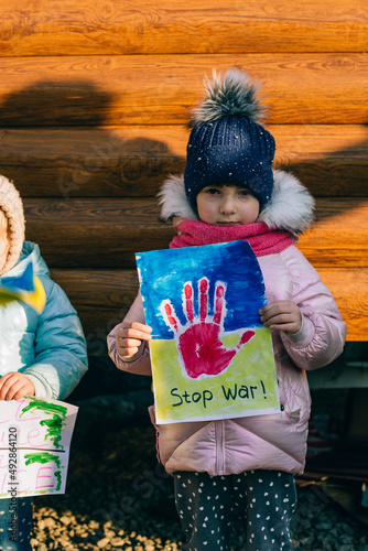 Small girls in protest against the war in Ukraine
