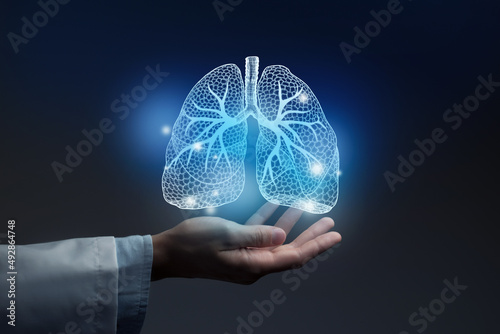 Medical banner with lungs illustration on blue background with large copy space