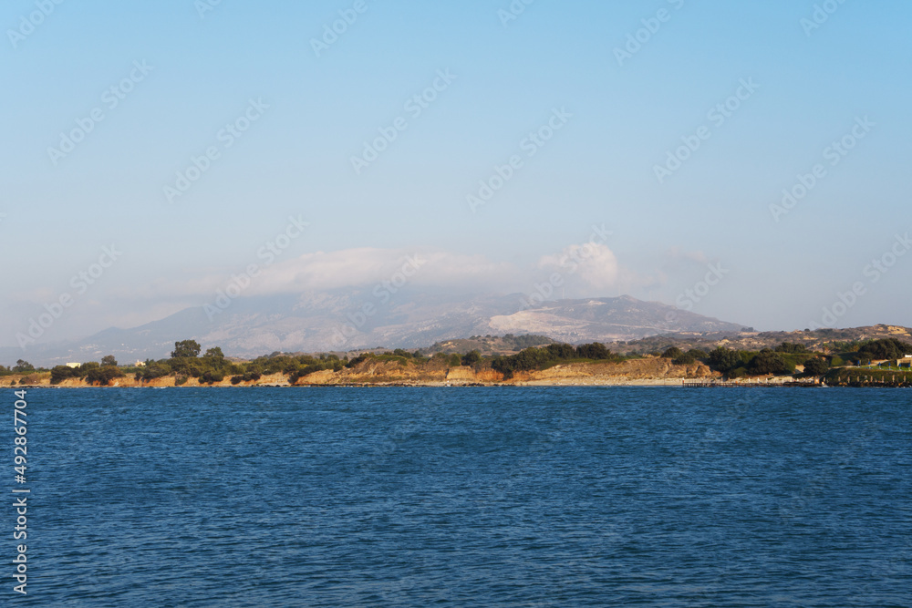 clouds over the Dikeos mountain on Kos island (Greece) clouds over the Dikeos mountain on Kos island (Greece)