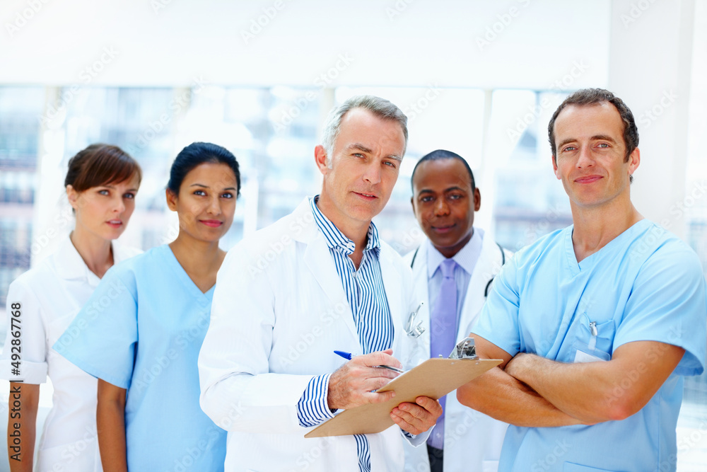 Fototapeta premium Group of healthcare professionals. Diverse team of healthcare professionals looking serious.