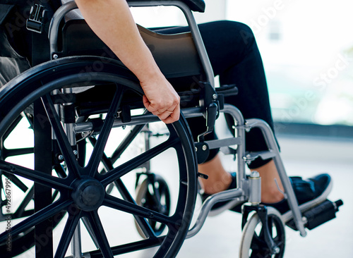 My disability wont stop me from living my life. Cropped shot of an unrecognizable woman sitting in a wheelchair.