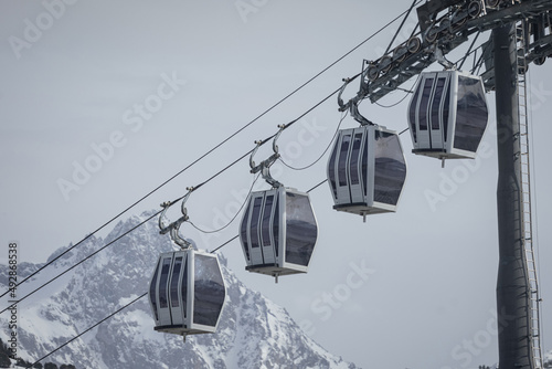 Cabin gondola with pulse movement action, four cabins in a row c photo
