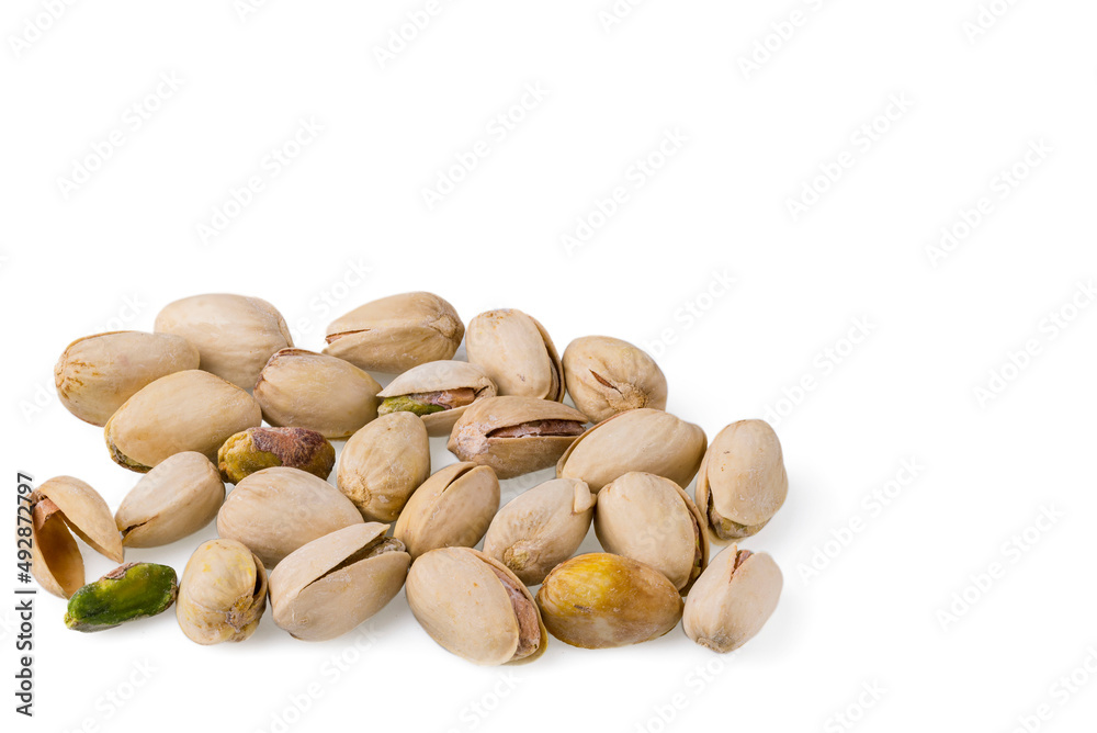 Close up view of pistachio nuts isolated on white background. Close up view of pistachio nuts isolated on white background.