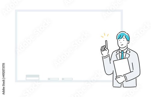 ホワイトボードの前で案内する会社員の男性